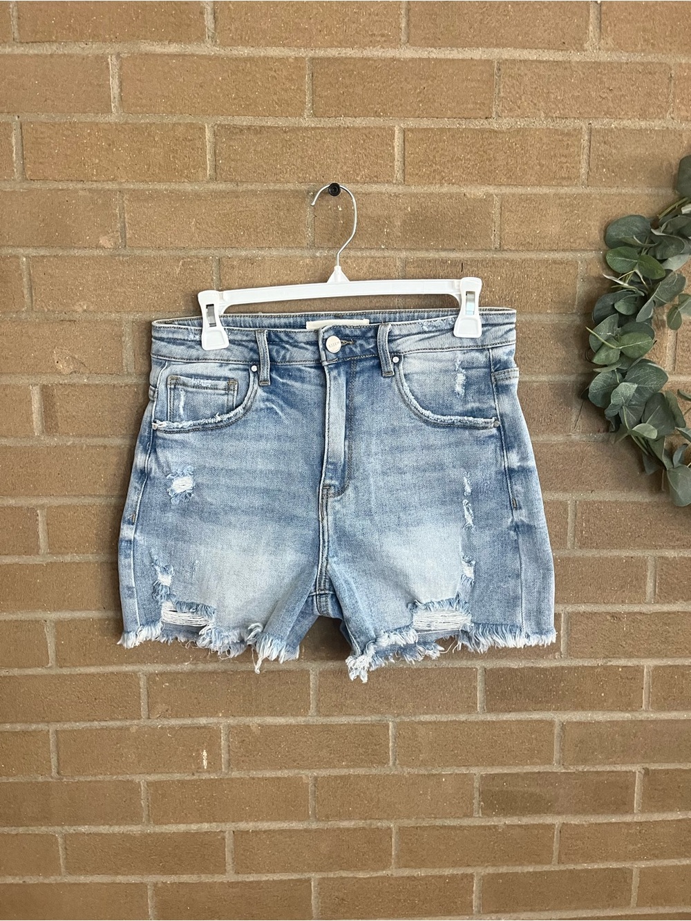 High-Rise Light Blue Distressed Denim Shorts